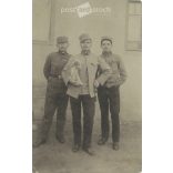 1920s. Young officers with a puppy. The people in the picture and the photographer are unknown. Original photo. Black and white photo sheet, postcard. (2793412)