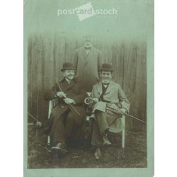   1920s. Cheerful men in hats, with walking sticks. The people in the picture and the photographer are unknown. Original paper image. Black and white photo, original paper image. (2793413)