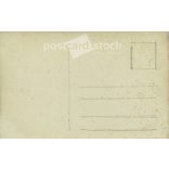 1920s. Studio photo of a young couple. The people in the photo and the photographer are unknown. Original paper photo, black and white photo, postcard. (2793428)