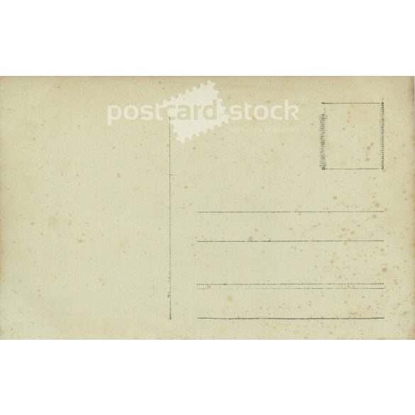 1920s. Studio photo of a young couple. The people in the photo and the photographer are unknown. Original paper photo, black and white photo, postcard. (2793428)