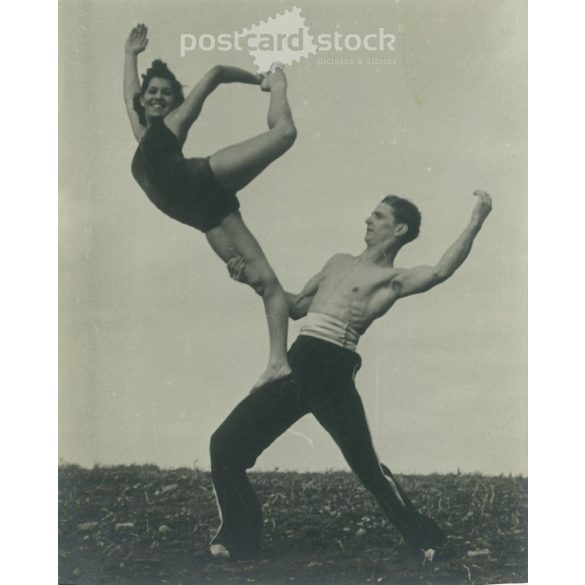 Young artistic couple in balance and harmony with each other. The people in the picture and the creator of the picture are unknown. Black and white photo, original paper print. (2793431)