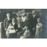 Studio photo of a family with many children. The people in the photo and the photographer are unknown. Original photo. Black and white photo card, postcard. (2793440)