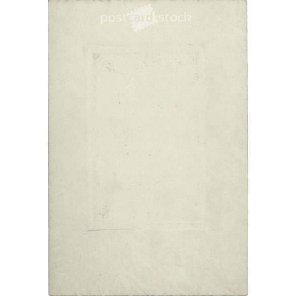 Early 1920s. Young woman in white, with a bow. The picture was taken in the photo studio of Károly Haberfeld. Black and white, laminated old photo, original paper image. (2793608)