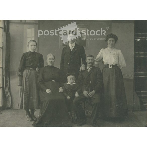 Early 1900s. Old family photo, studio shot. The people in the photo and the photographer are unknown. Black and white, large, laminated old photo, original paper image. (2793609)