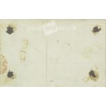 Studio photo of a family of four. The people in the photo and the photographer are unknown. Gelatin silver. Original old photo. Black and white photo card, old postcard. (2793612)