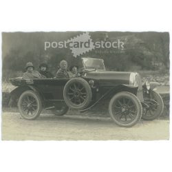   Early 1900s. A group of four people driving a car. The photo was taken by Hans Jager’s photo studio in Klagenfurt. The people in the photo are unknown. Original old photo. Black and white photo, old postcard. (2793617)