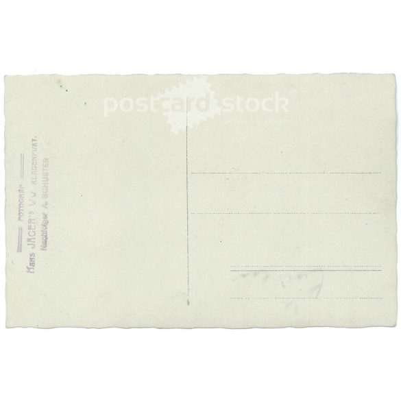 Early 1900s. A group of four people driving a car. The photo was taken by Hans Jager’s photo studio in Klagenfurt. The people in the photo are unknown. Original old photo. Black and white photo, old postcard. (2793617)