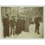 1910s. Officers in the snowy courtyard. The people in the picture and the photographer are unknown. Old photo. Black and white photo, original paper image. (2793618)