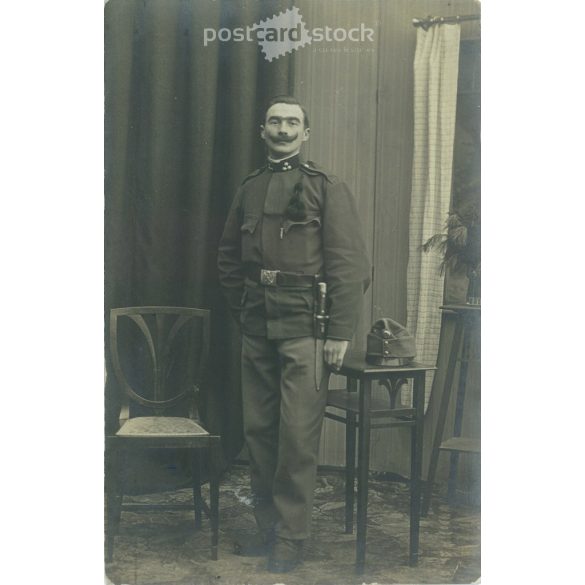 1915. Studio photo of a young officer, Salzburg stamped. The person in the photo and the photographer are unknown. Original old photo. Gelatin silver. Black and white photo plate, old postcard. (2793619)