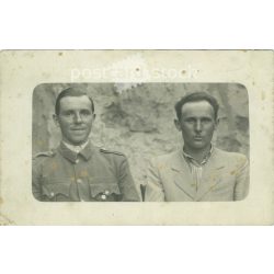   Brothers. The people in the picture and the photographer are unknown. Original old photo. Black and white photo, old postcard. (2793629)