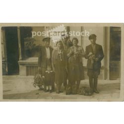   1942 – Group photo with grapes. The people in the photo and the photographer are unknown. Original old photo. Black and white photo album, old postcard. (2793638)