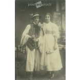 1911 - Young couple in folk costumes. The photo was taken in Sándor Tihanyi’s photo studio in Salgótarján. Original old photo. Black and white photo, old postcard. (2793639)