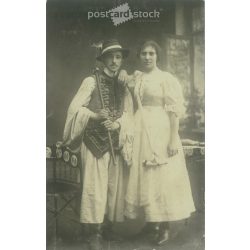   1911 – Young couple in folk costumes. The photo was taken in Sándor Tihanyi’s photo studio in Salgótarján. Original old photo. Black and white photo, old postcard. (2793639)