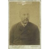 Late 1800s. Studio portrait of a man. The photo was taken in Heinrich Adleff’s studio in Brașov. The person in the photo is unknown. Old photo. Original  Cabinet card / CDV photo / hardback photo. (2793642)