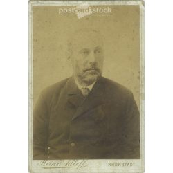   Late 1800s. Studio portrait of a man. The photo was taken in Heinrich Adleff’s studio in Brașov. The person in the photo is unknown. Old photo. Original  Cabinet card / CDV photo / hardback photo. (2793642)