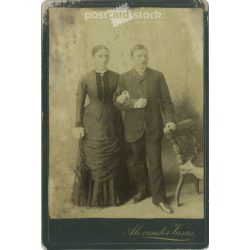   Early 1900s. Studio photo of a young couple. The photo was taken in Alexander Vasas’s studio. The person in the photo is unknown. Old photo. Original  Cabinet card / CDV photo / hardback photo. (2793643)