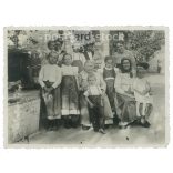 Family photo, group photo from the 1910s. The people in the photo and the photographer are unknown. Old photo. Black and white photo, original paper photo. (2793646)