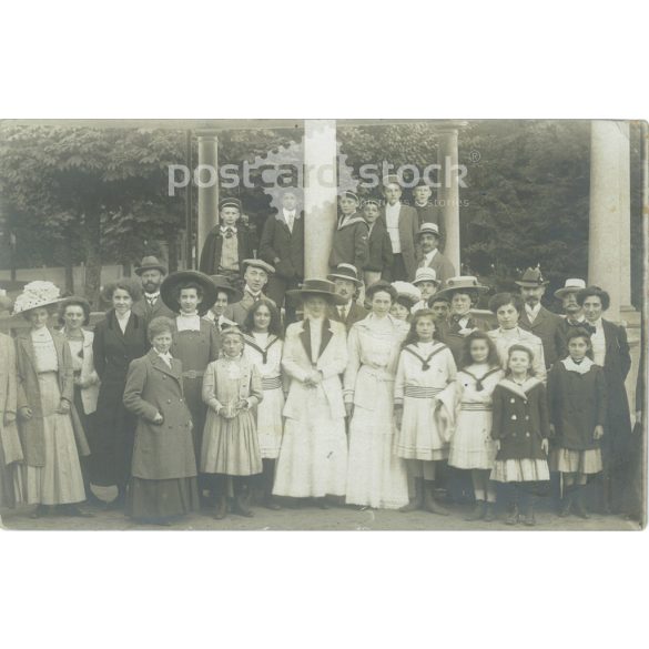 1910s. Group photo of people on vacation. The people in the photo and the photographer are unknown. Original old photo. Black and white photo, old postcard. (2793647)