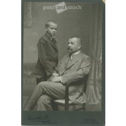   Studio photo of father and son. The photo was taken in the photo studio of Goszleth István és Fia, Budapest. Old photo. Original  Cabinet card / CDV photo / hardback photo. (2793666)