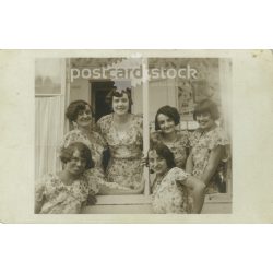   Girls in identical clothes. The people in the picture and the photographer are unknown. Original old photo. Black and white photo sheet, old postcard. (2793670)