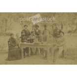 Late 1800s. Family group photo in the garden. The people in the photo and the photographer are unknown. Original old photo. Black and white, laminated photo, original paper photo. (2793672)