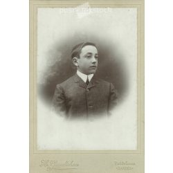   Studio photo of a young man. The photo was taken in the H. Gaudichon photo studio in Cannes. Old photo. Original  Cabinet card / CDV photo / hardback photo. (2793673)