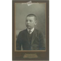   Circa 1910 - Studio portrait photo of a young boy. The photo was taken in Gyula Ruzicska’s photo studio in Debrecen. Old photo. Original cabinet photo / hardback photo / business card, CDV photo. (2793758)