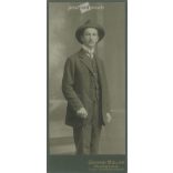 1909 - Studio photo of a young man in a hat. The picture was taken in Johann Müller’s studio in Rumburg. Old photo. Original cabinet photo / hardback photo / business card, CDV photo. (2793761)
