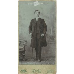   Circa 1900 - Full-length studio photo of a young man. The photo was taken in the Dunky Brothers’ photo studio in Cluj-Napoca. Old photo. Original cabinet photo / hardback photo / business card, CDV photo. (2793762)
