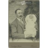 Circa 1900 - Father and his newborn child. The picture was taken in the photo studio of Sándor Csízhegyi, in Cluj-Napoca. Old photo. Original cabinet photo / hardback photo / business card, CDV photo. (2793767)