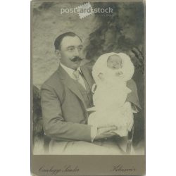   Circa 1900 - Father and his newborn child. The picture was taken in the photo studio of Sándor Csízhegyi, in Cluj-Napoca. Old photo. Original cabinet photo / hardback photo / business card, CDV photo. (2793767)