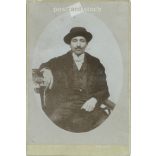 Circa 1910 - Young man, presumably from Transylvania. The person in the picture and the photographer are unknown. Original old photo. Black and white, laminated photo, original paper photo. (2793787)