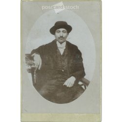   Circa 1910 - Young man, presumably from Transylvania. The person in the picture and the photographer are unknown. Original old photo. Black and white, laminated photo, original paper photo. (2793787)