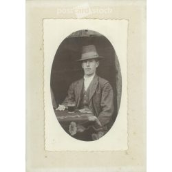   Circa 1910 - János Vidovernyecz drinking wine, with a cigarette, in Békéscsaba. The author of the picture is unknown. Original old photo. Black and white, laminated photo, original paper image. (2793788)