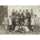 Circa 1930 - Cheerful carnival party. The people in the picture and the photographer are unknown. Original old photo. Black and white photo, original paper image. (2793789)