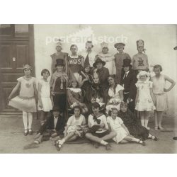   Circa 1930 - Cheerful carnival party. The people in the picture and the photographer are unknown. Original old photo. Black and white photo, original paper image. (2793789)