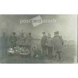   Circa 1920 - Photo of officers and civilians. The people in the photo and the photographer are unknown. Old photo. Black and white photo sheet, original paper image. (2793796)