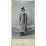 Elegant, young man in a top hat, with a walking stick. The picture was taken in Ágoston Schmidt’s photo studio in Budapest. Original  Cabinet card / CDV photo / hardback photo. (2793840)