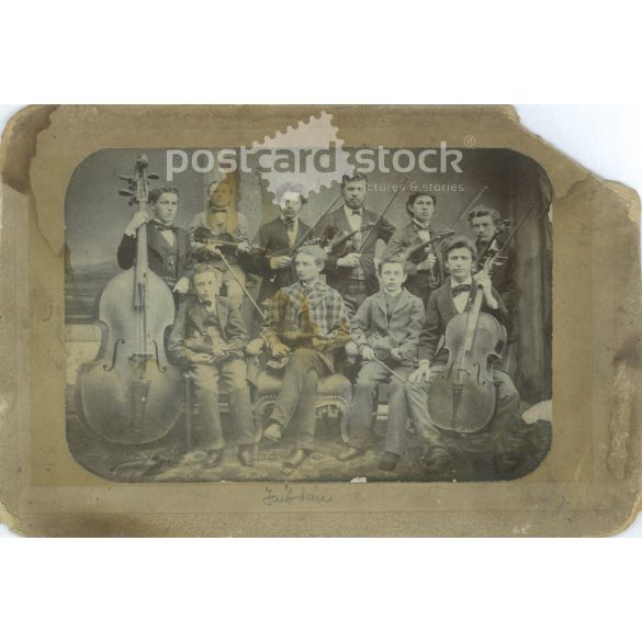 Group photo of a string orchestra. The identity of the people in the photo is unknown. The photo is a work by Rembrandt Televirda, taken in Székesfehérvár. Original old photo. Black and white, laminated photo, original paper photo. (2793854)
