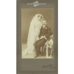   1913 - Studio photo of Gyula Schneider and his wife. The photo was taken in Dezső Rozgonyi’s photo studio in Budapest. Original old photo. Black and white, laminated photo, original paper image. (2793855)