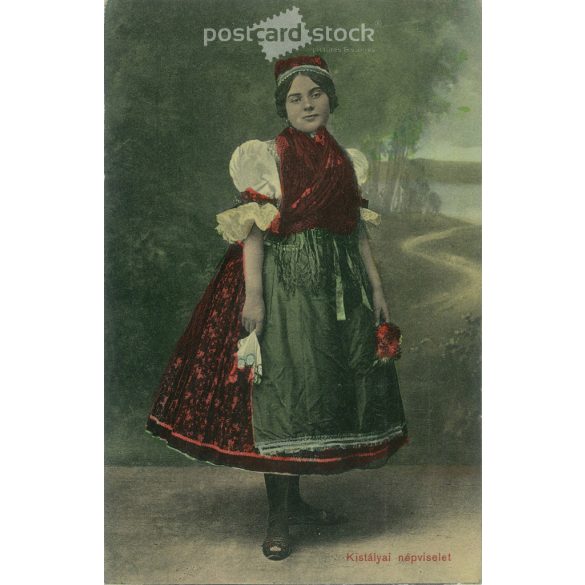 Kistálya folk costume. The person in the picture and the photographer are unknown. Colored photo. Old postcard. (2793863)