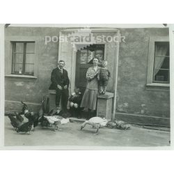   1930 - Family group photo at the entrance, with pets. The people in the photo and the photographer are unknown. Original old photo. Black and white photo, original paper photo. (2793873)