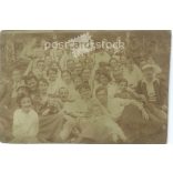 1919 - Group photo outdoors. The photo shows young people on an excursion. The identity of the people in the photo and the photographer are unknown. Original old photo. Black and white photo album, old postcard. (2793886)