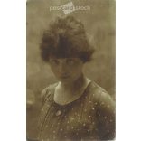 Photo of a young girl. The people in the photo and the photographer are unknown. Original old photo. Black and white photo card, old postcard. (2793887)