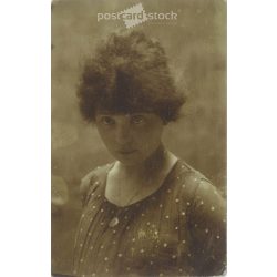   Photo of a young girl. The people in the photo and the photographer are unknown. Original old photo. Black and white photo card, old postcard. (2793887)