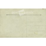 Photo of a young girl. The people in the photo and the photographer are unknown. Original old photo. Black and white photo card, old postcard. (2793887)