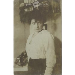   Photo of a young girl. The person in the photo and the photographer are unknown. Original old photo. Black and white photo, original paper photo. (2793888)