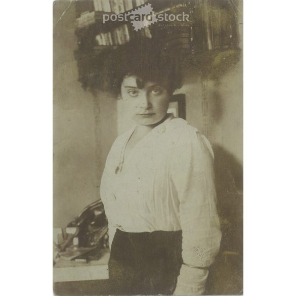 Photo of a young girl. The person in the photo and the photographer are unknown. Original old photo. Black and white photo, original paper photo. (2793888)