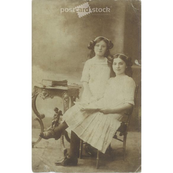 Early 1900s. Aranka and Ella. The photographer is unknown. Original old photo. Black and white photo, old postcard. (2793890)