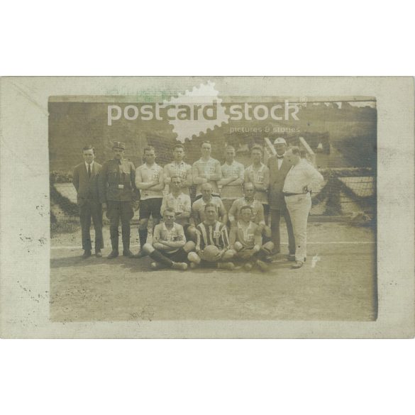 Photo of a football team. The people in the photo and the photographer are unknown. Original photo. Black and white photo card, old postcard. (2793895)